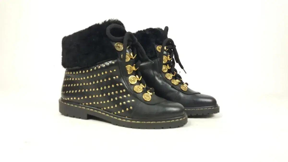 마르코 징장식 검정색 가죽 여성 앵클부츠