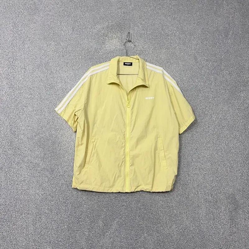 널디 옐로우 로고 반팔 바람막이 집업 M