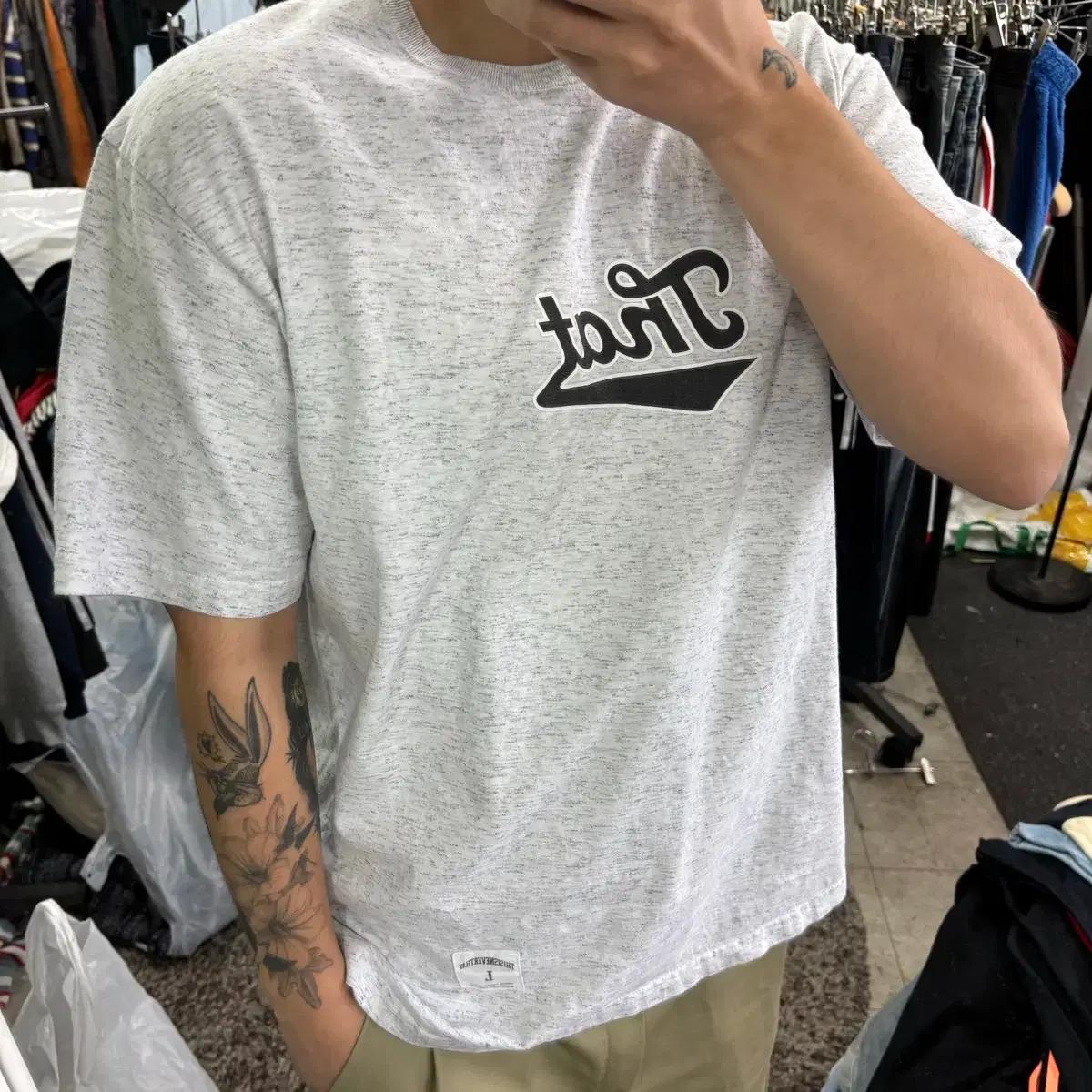 L 디스이즈네버댓 멜란지레이 오버핏 THAT로고 반팔티