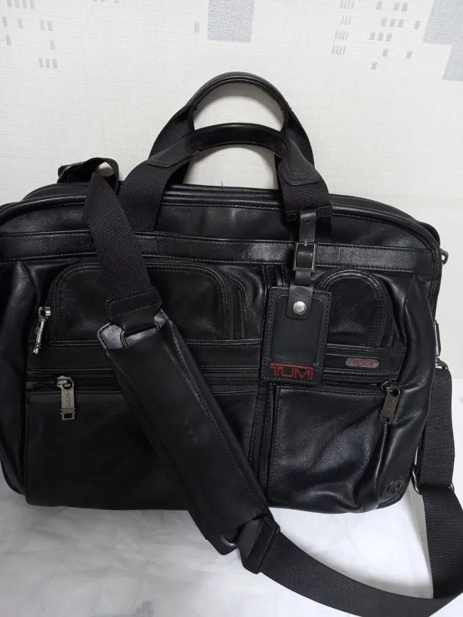 투미가죽티패스서류가방