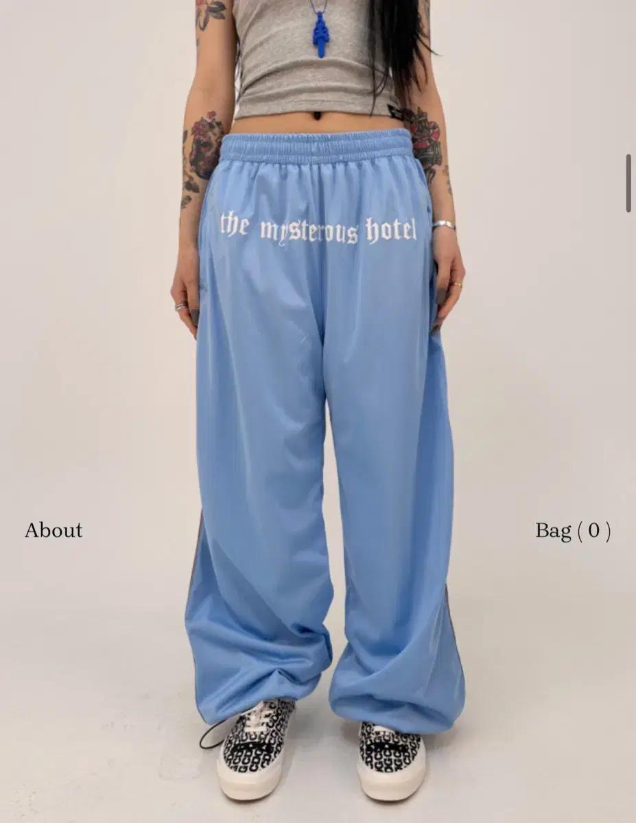 The Mysterious Hotel 더미스테리어스호텔 트레이닝저지팬츠