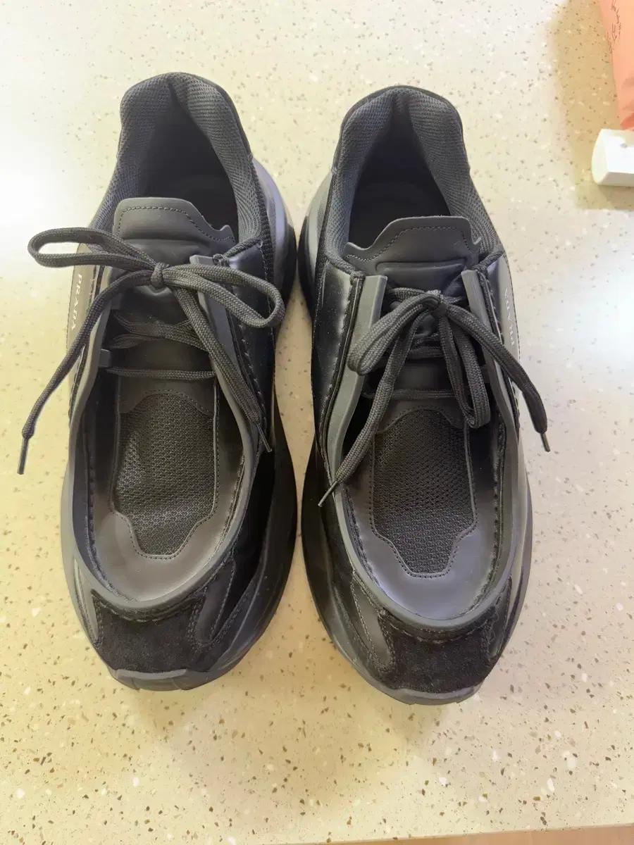 프라다 청키 브러시드 스니커즈