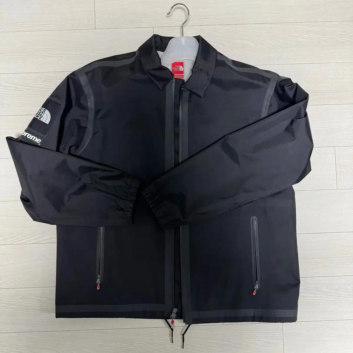 21ss 슈프림 x 노스페이스 테이프심 코치 자켓