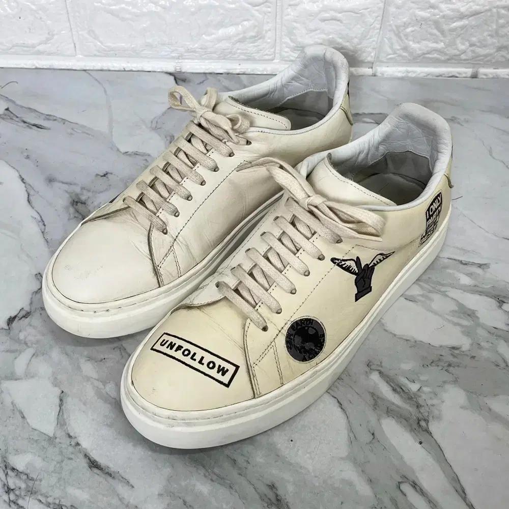 [270] 시스템 그래픽 아이보리 가죽 남자 스니커즈