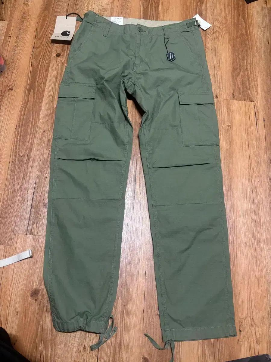 칼하트 WIP 에비에이션 팬츠 달러 그린
