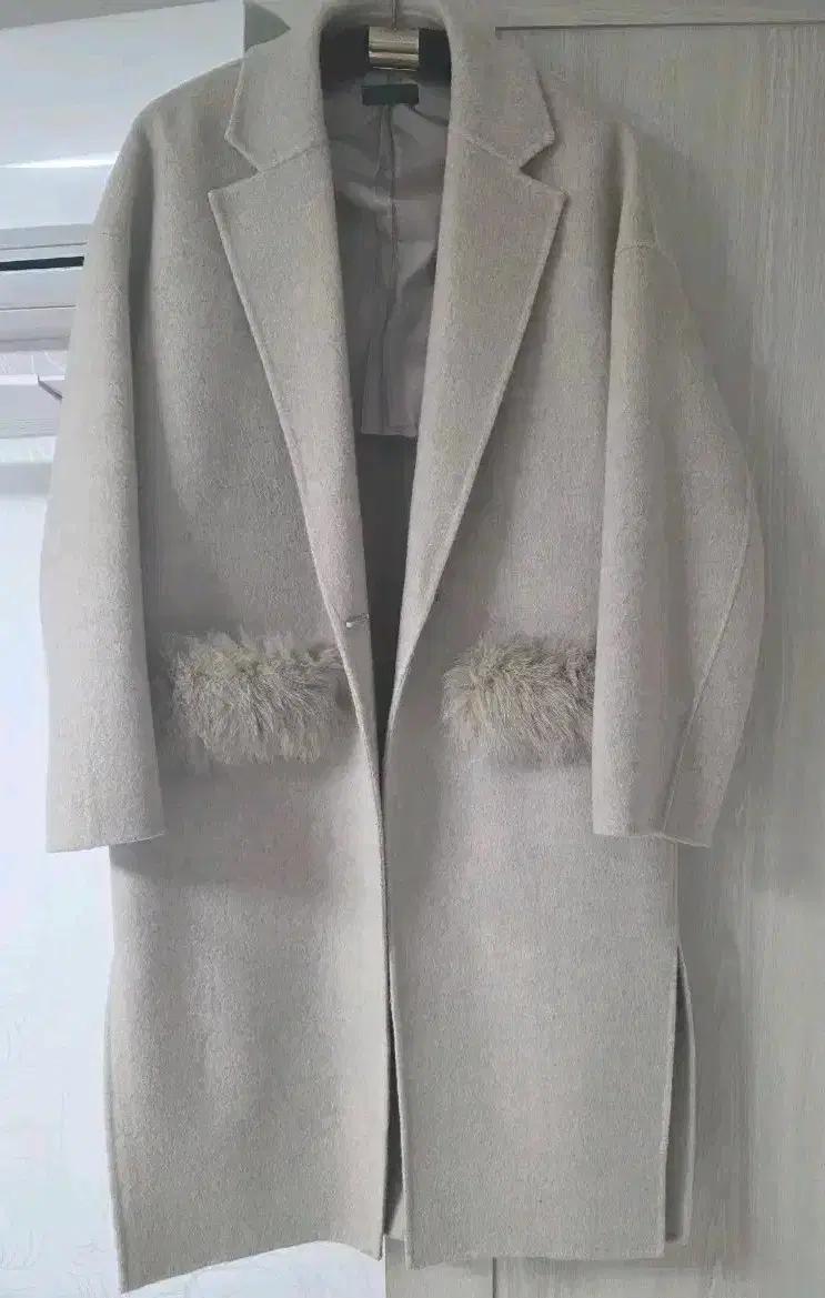 (중고) 베네통 여성 오트밀 퍼 포인트 롱 코트 42(55사이즈)루즈핏