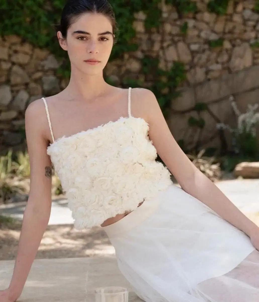 더티스 로즈 슬리브리스 뷔스티에 탑 아이보리 S