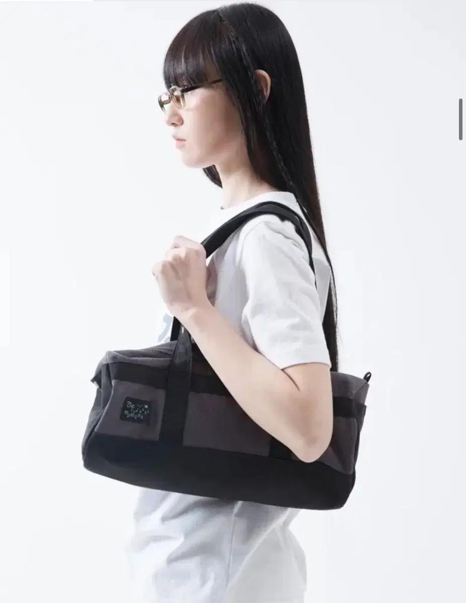 더콜디스트모먼트 더플백 TCM mini duffle bag (black)