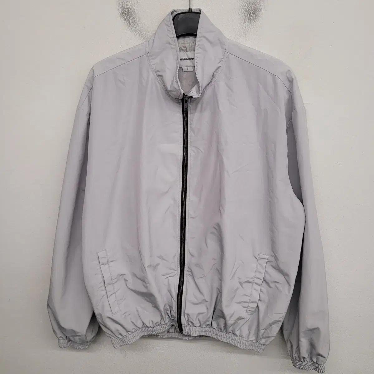 [100/L] 디스이즈네버댓 바람막이 자켓