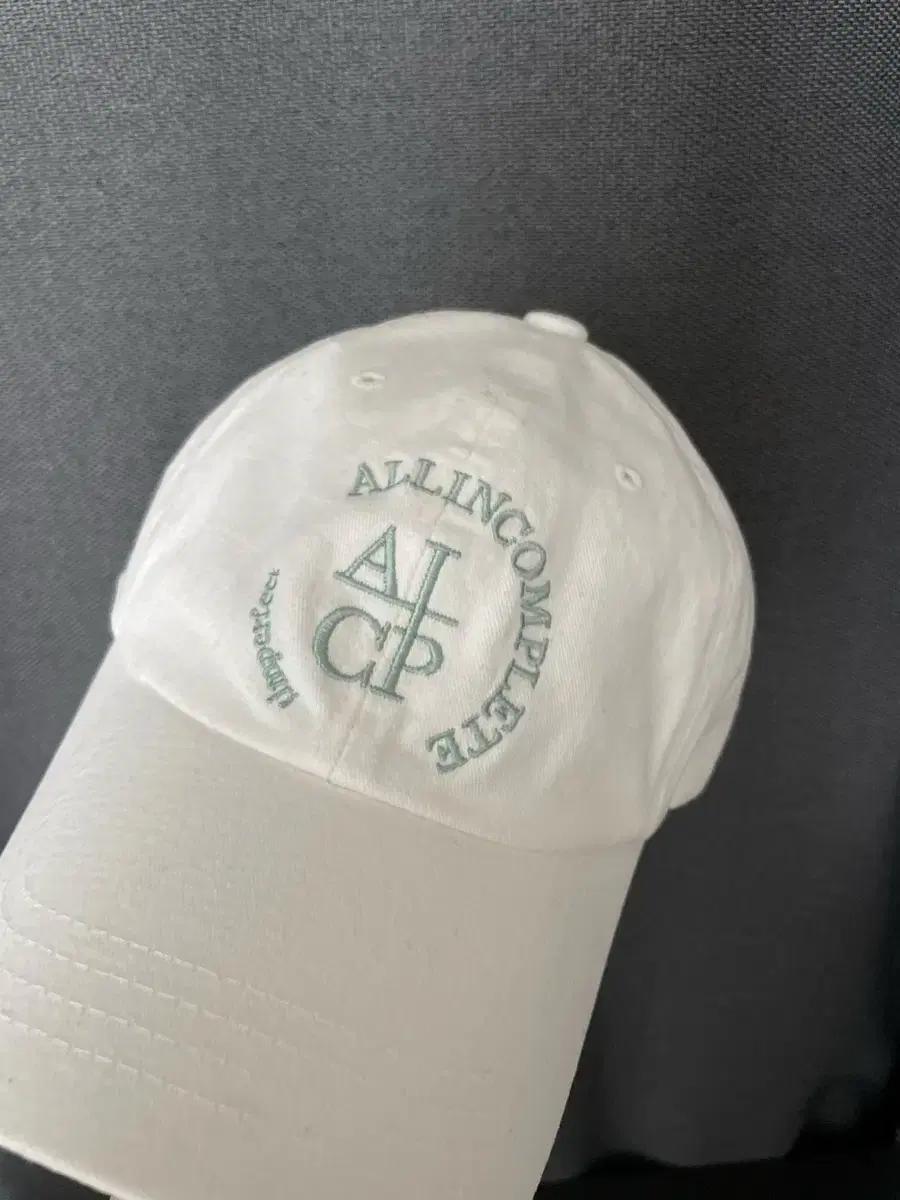 올인컴플리트 볼캡 화이트