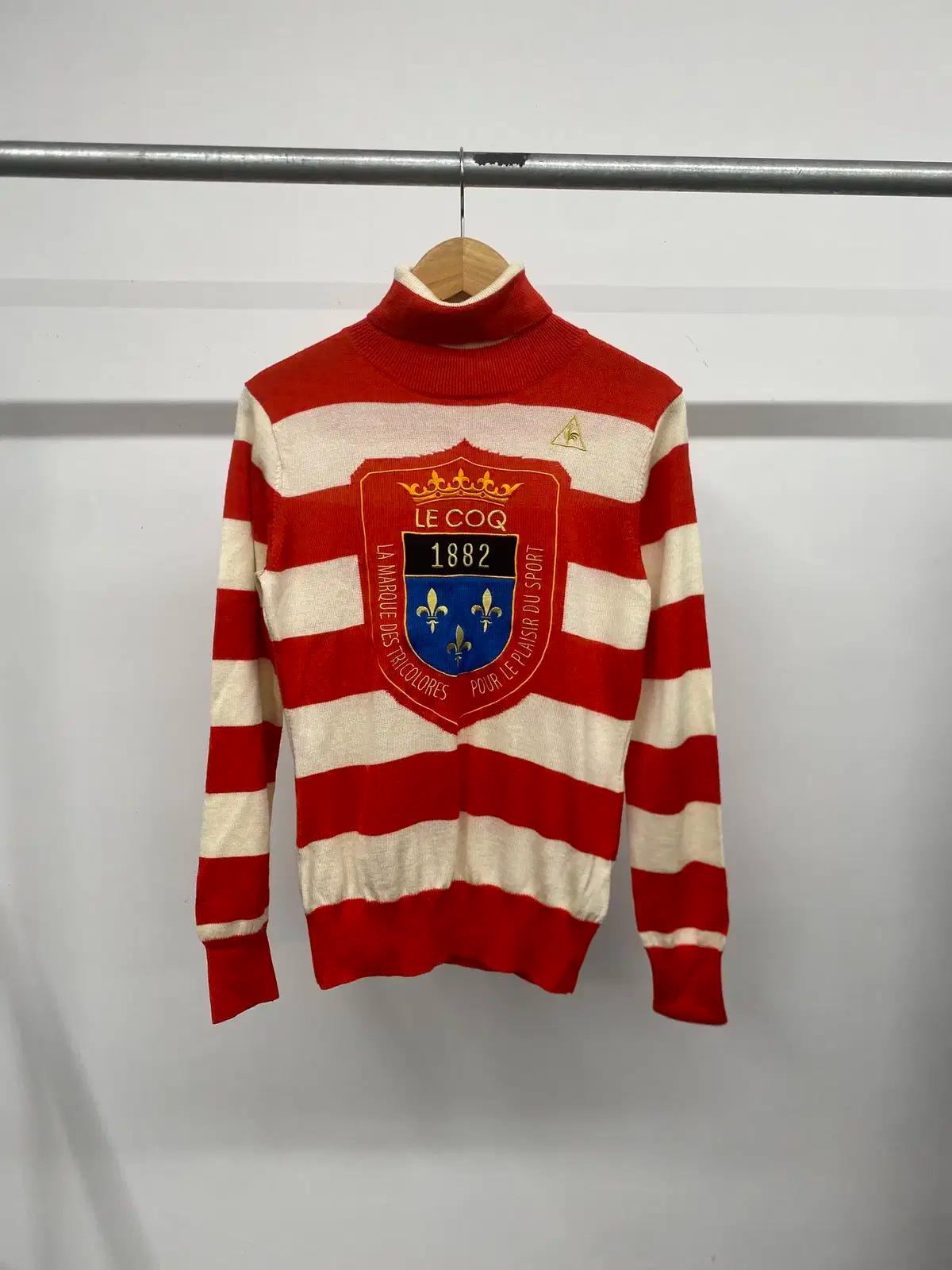 여성용 르꼬끄 골프 울혼방 패치 스트라이프 터틀넥 목티 니트 스웨터