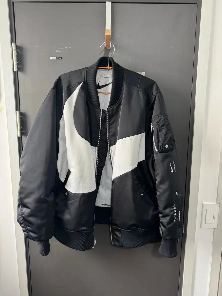 나이키 NSW 스우시 써마핏 봄버 블랙 - 아시아