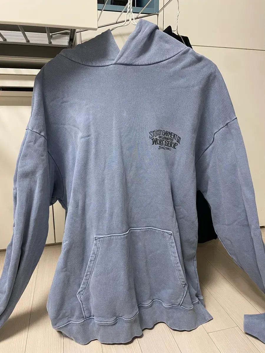 스투시 x 아워레가시 워크샵 서프맨 피그먼트 다이드 후드 블루 L사이즈