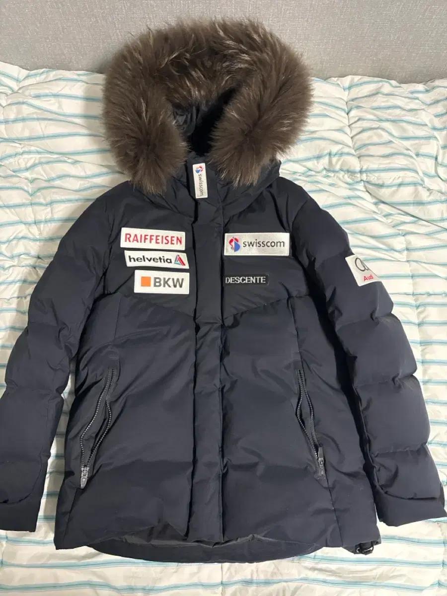 데상트 스위스 스키 패딩