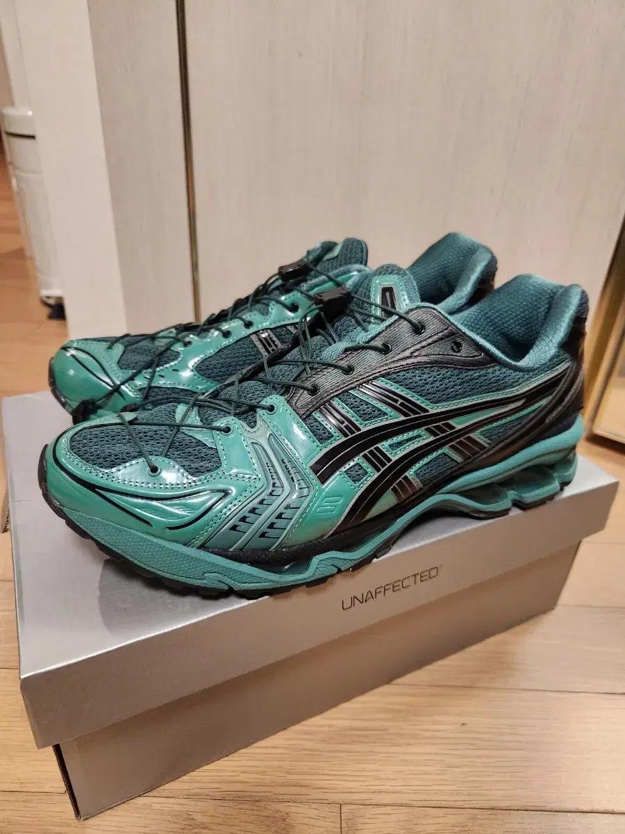 (295) 아식스 언어펙티드 우라노스 그린