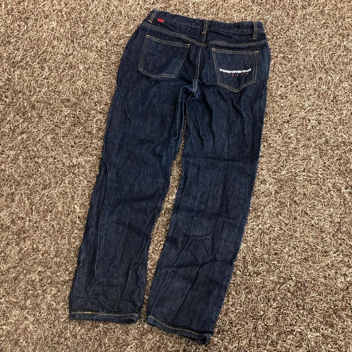 M 디스이즈네버댓 워싱 포켓로고 데님팬츠
