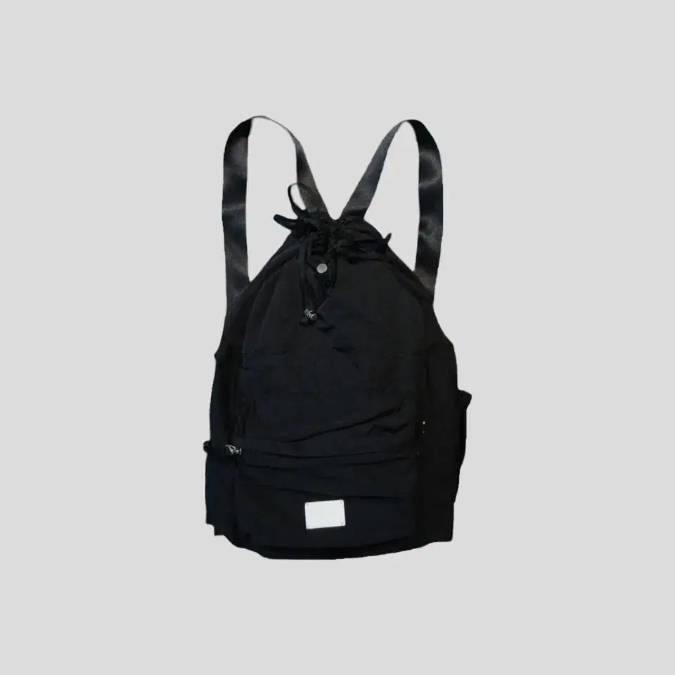 FENNEC 페넥 블랙 로고패치 나일론 스트링 복조리가방 백팩 럭색