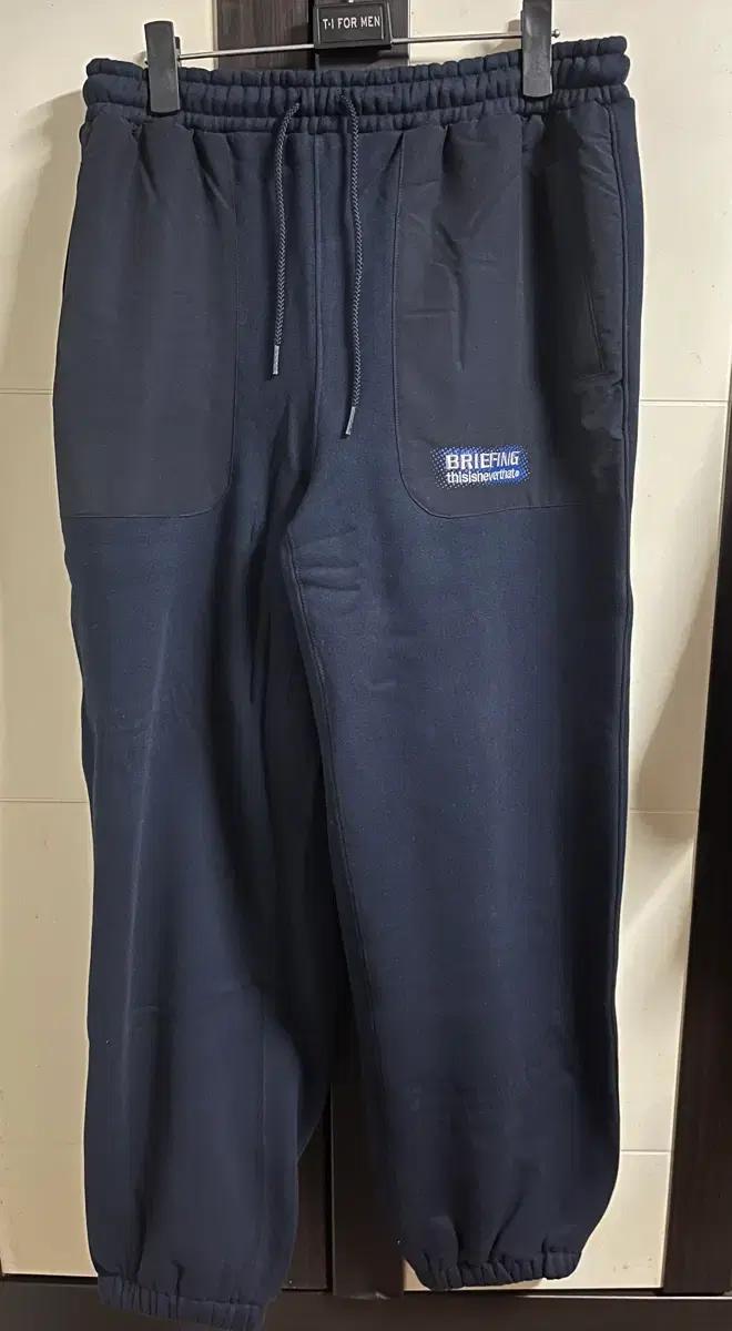디스이즈네버댓 스웨트팬츠 네이비색 M사이즈 팝니다