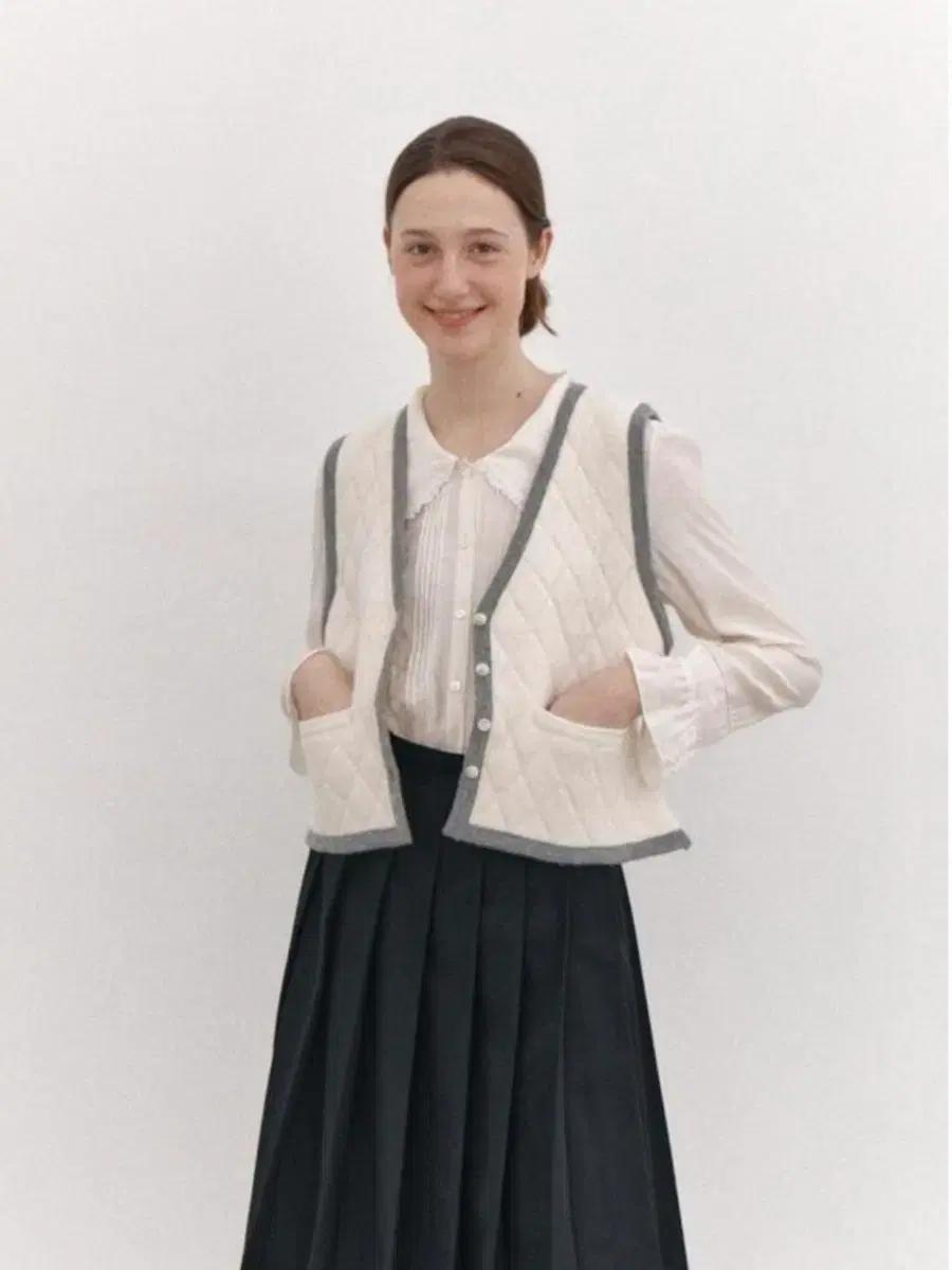 타낫 퀄팅 니트베스트