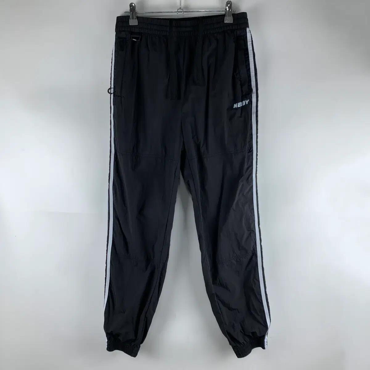 널디 블랙 나일론 우븐 트레이닝 조거팬츠 S .251205
