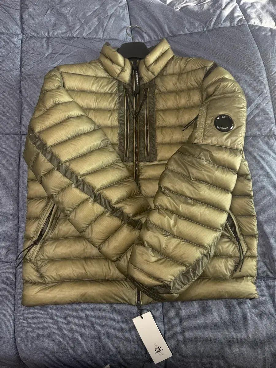 CP컴퍼니 DD쉘 패딩 고글 다운 자켓  25FW