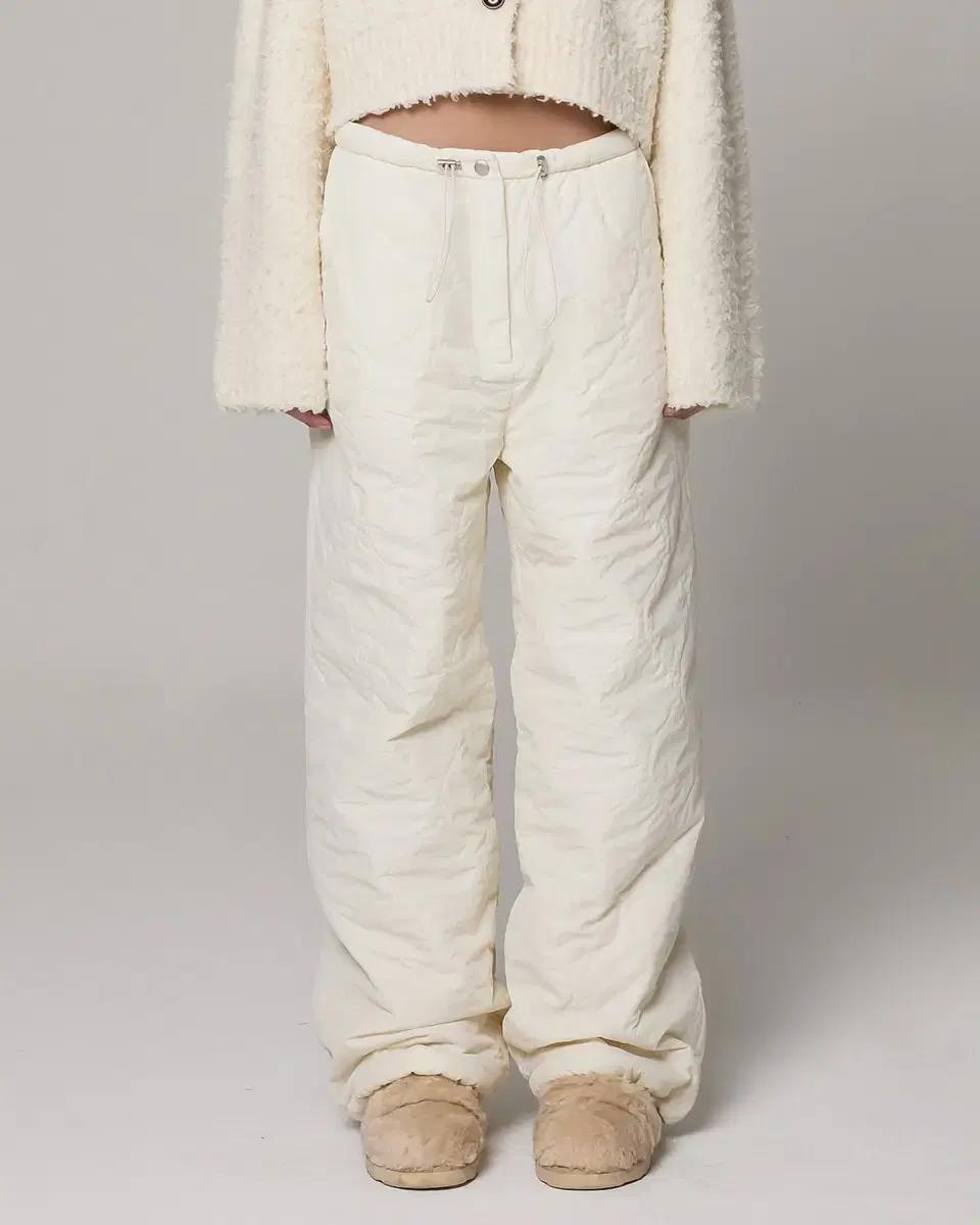 더포르타 wave quilted padded pants