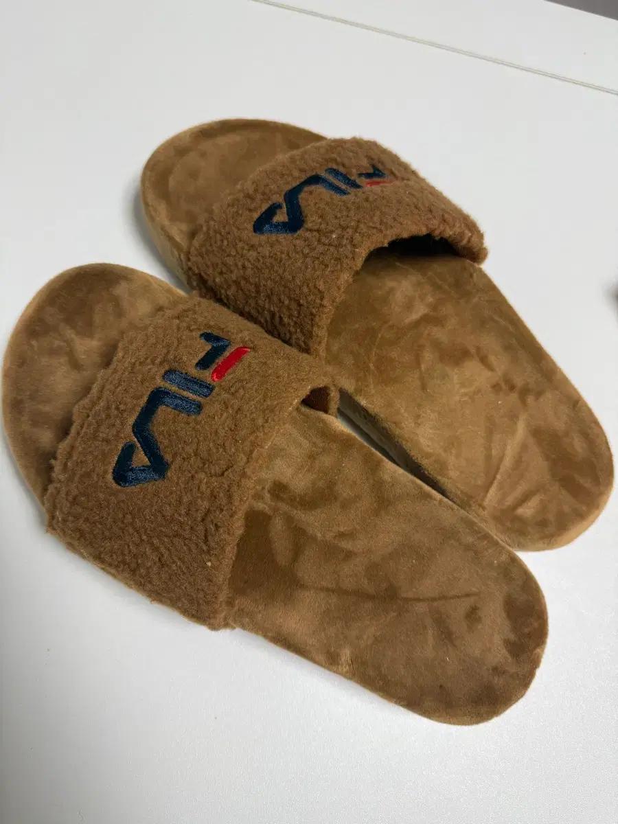 휠라 드리프터 크레마 1SM00820-926 털 슬리퍼
