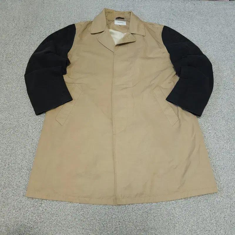 [M] 디스이즈네버댓 트렌치 코트