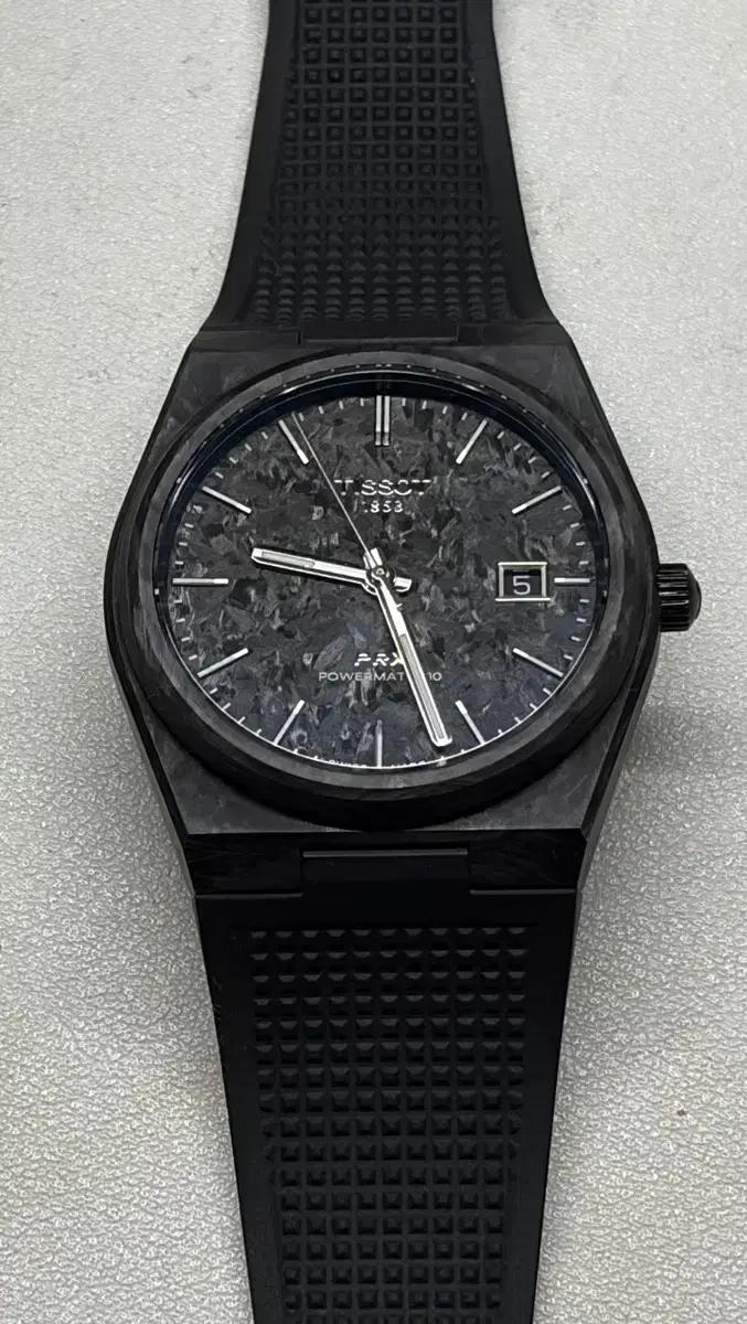 티쏘 PRX 파워매틱 카본 40mm (25.07)