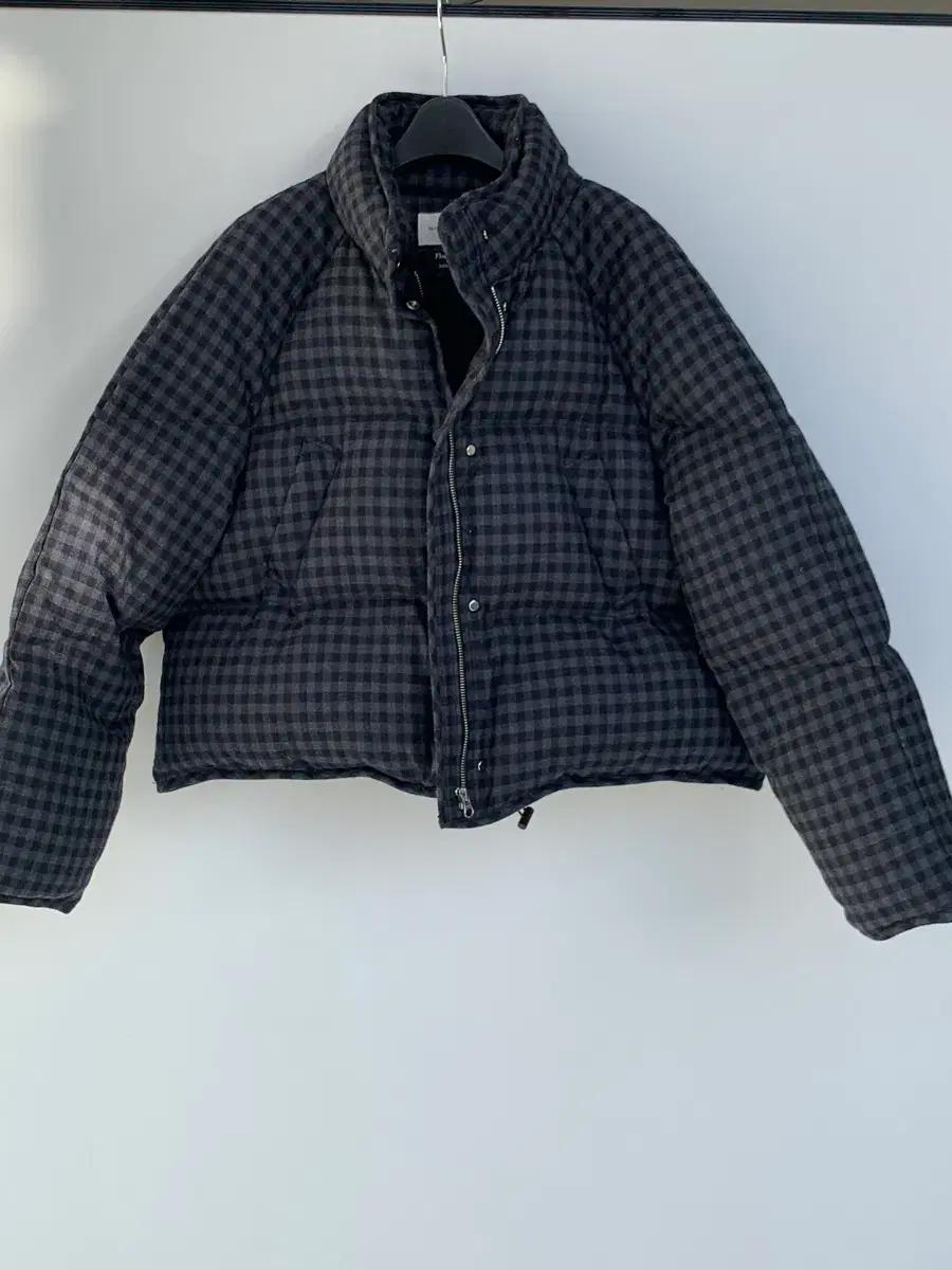 낫띵리튼 Cropped string puffer jacket
