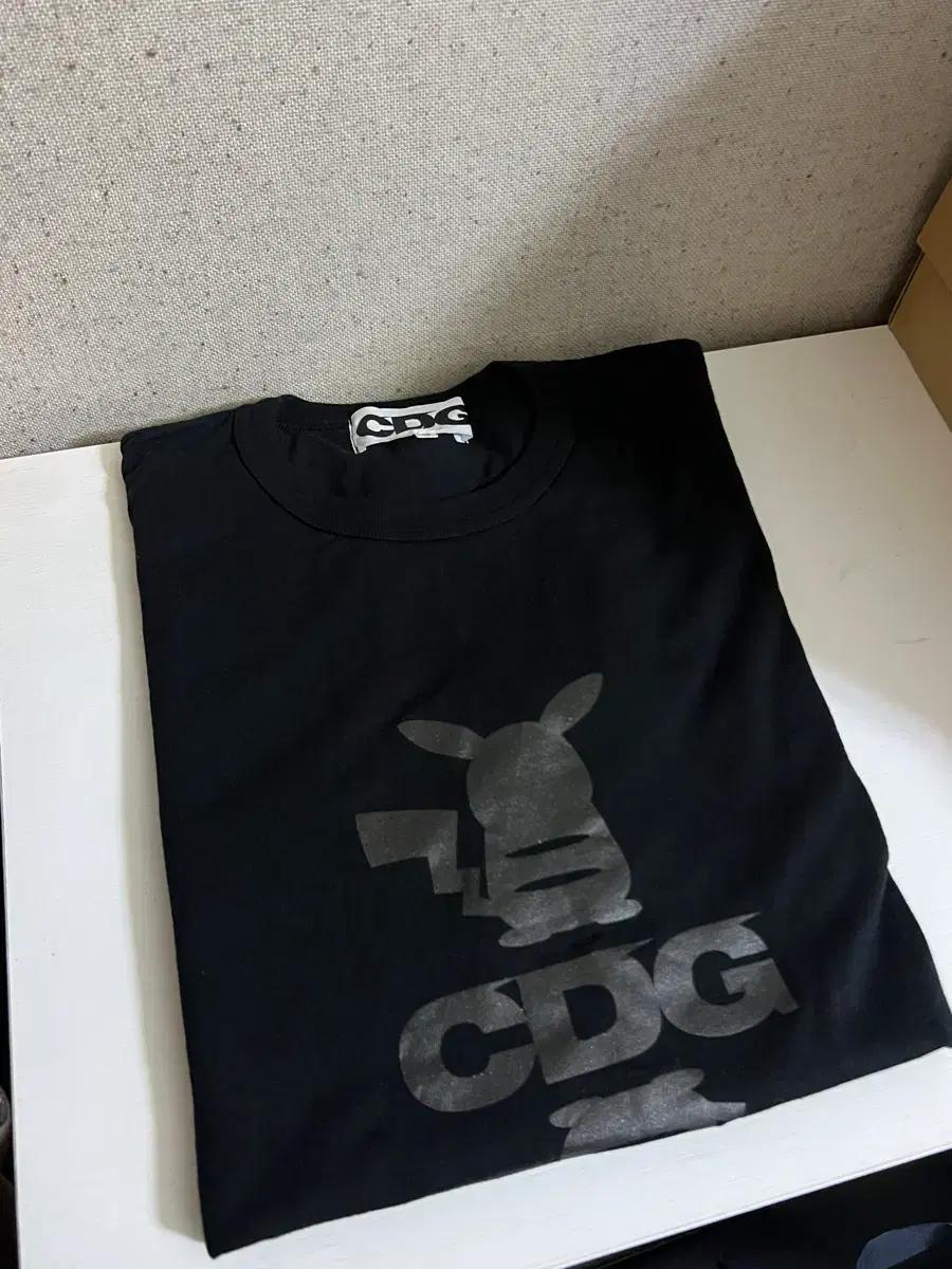 꼼데가르송 CDG 포켓몬스터 블랙 긴팔티셔츠