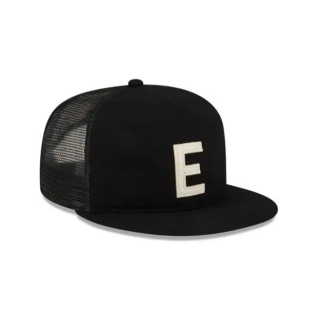 fear of god essentials new era E trucker