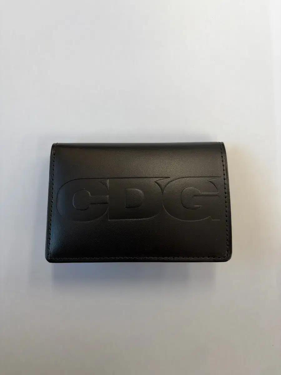 CDG(꼼데가르송) 엠보스 로고 지갑 팝니다
