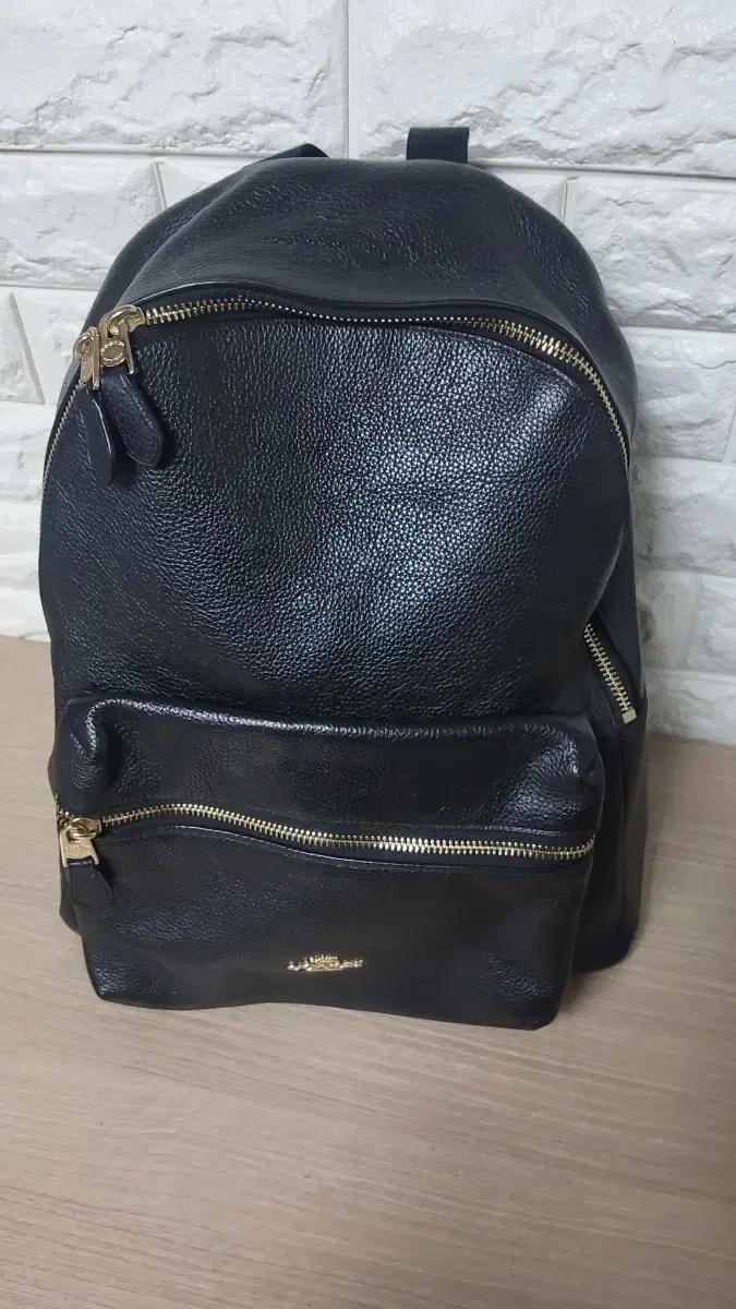 코치 블랙 가죽 백팩