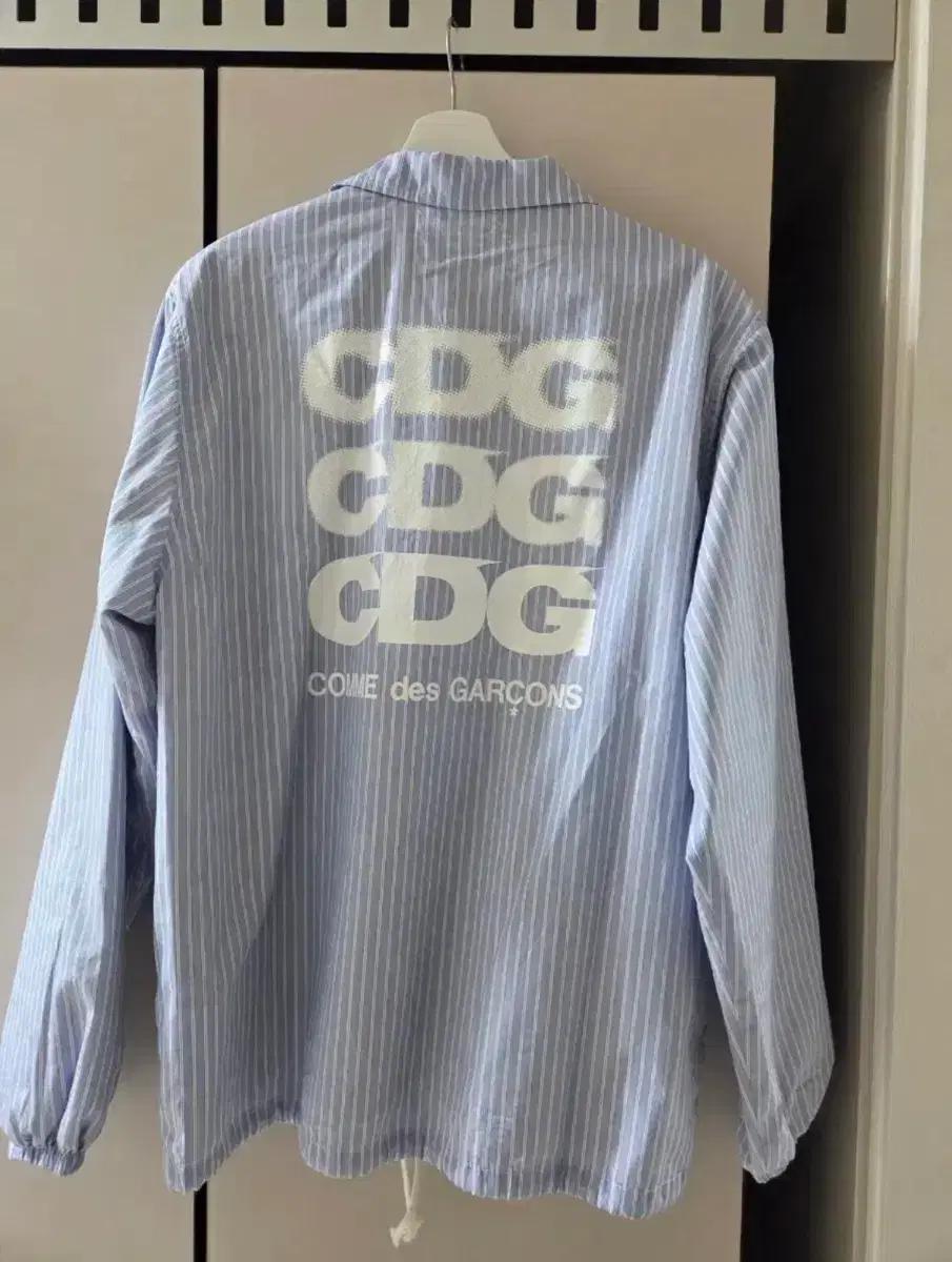 꼼데가르송 CDG 스트라이프 코치 자켓 (지디 착용/국문택)