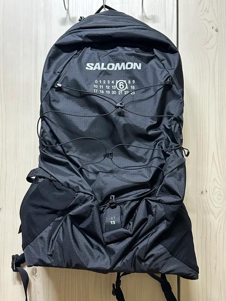 살로몬 x MM6 마르지엘라 15XT 백팩