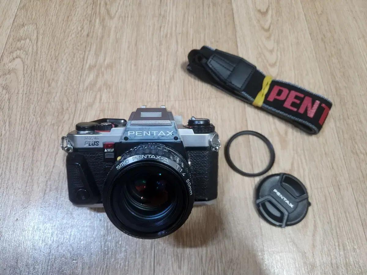 펜탁스 프로그램 plus 바디및 50mm f1.4 A렌즈 셋트 입니다