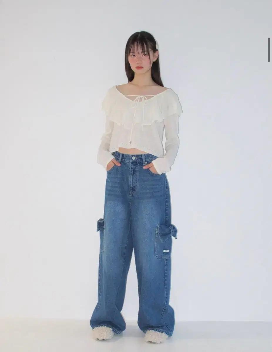 론론 RUFFLE SKASHI KNIT BLOUSE IVORY
