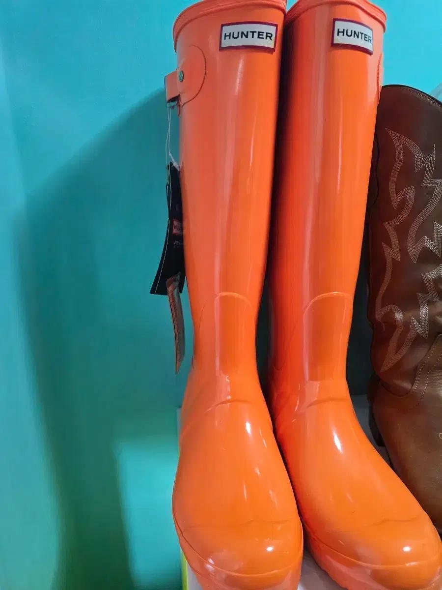 250~255헌터 페스티벌 플루오르 톨 레인부츠 오렌지 색상입니다