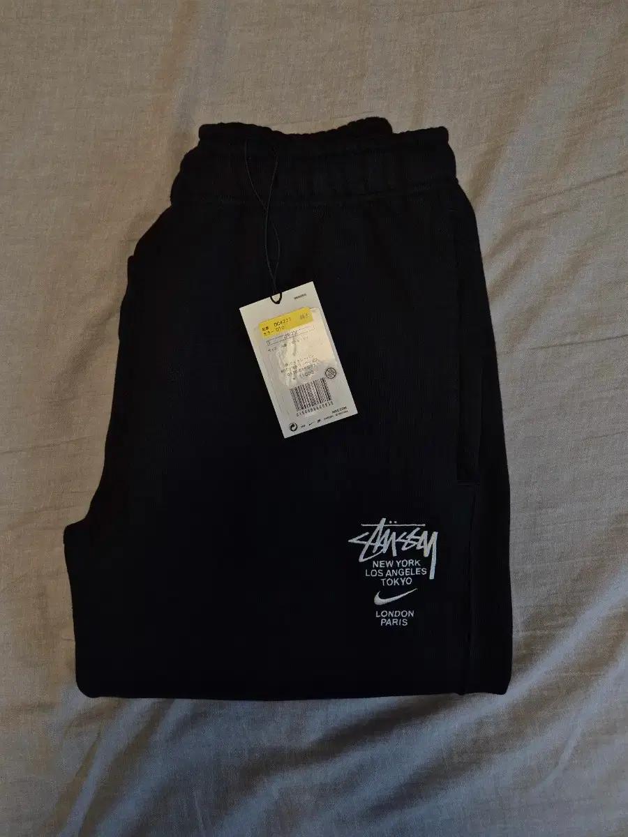 나이키 스투시 NRG 플리스 팬츠