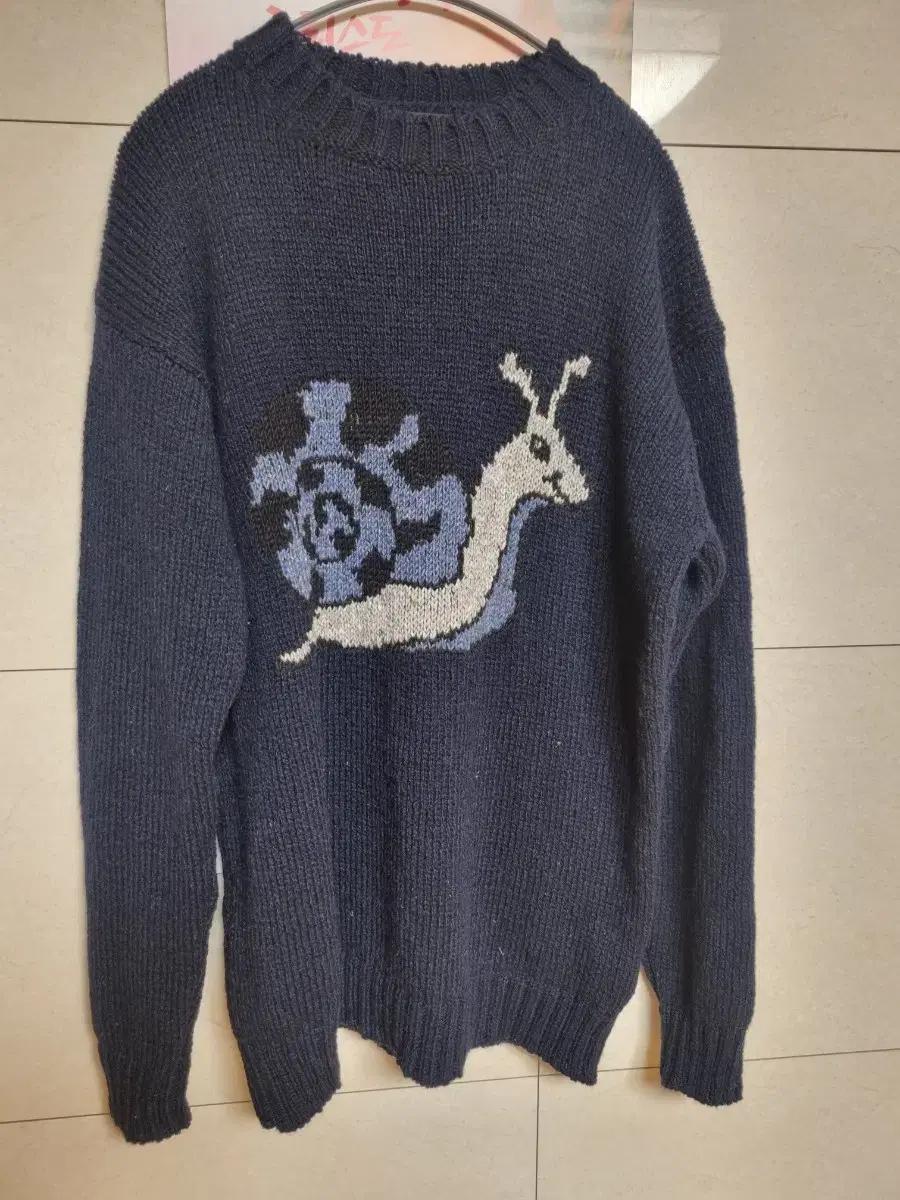 하울린 스네일 니트 110