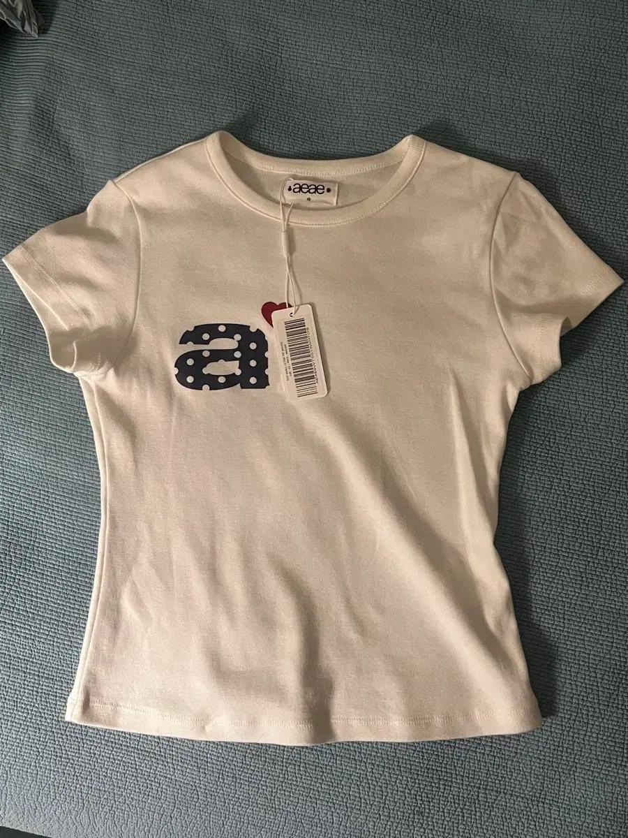 aeae 도트 반팔 DOT SMALL LETTER TEE 화이트 팝니다