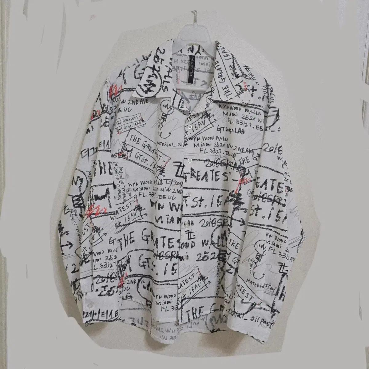 더그레이티스트 셔츠