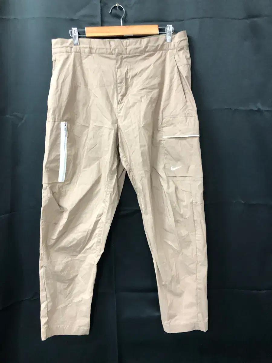 나이키 에센셜 우븐 언라인드 포켓 카고 팬츠