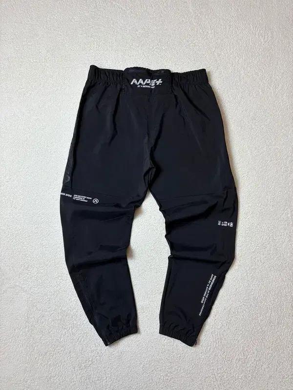 에이프 Aape 스포티 스트레이트 팬츠 PN6323