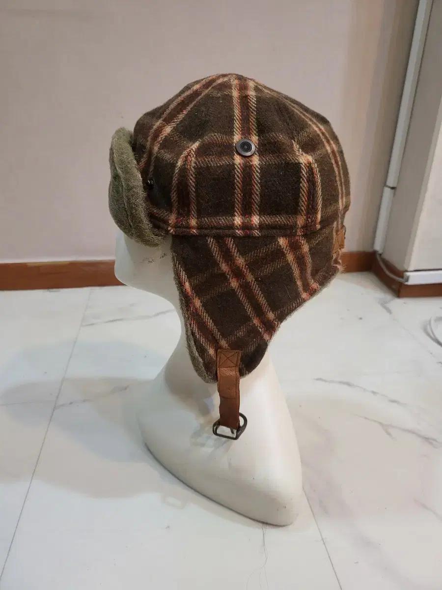 써스데이아일랜드 군밤 모자 귀달이 모자 방한모자