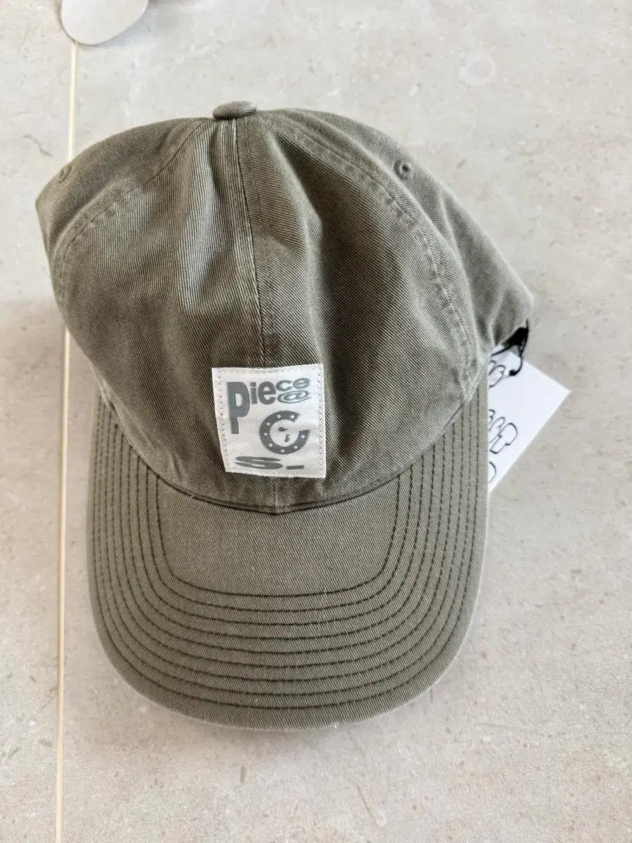 (새상품) 더콜디스트모먼트 볼캡 모자 TCM piece cap