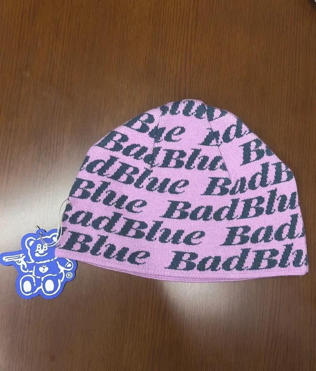 (새상품)배드블루 로고 패턴 비니 badblue